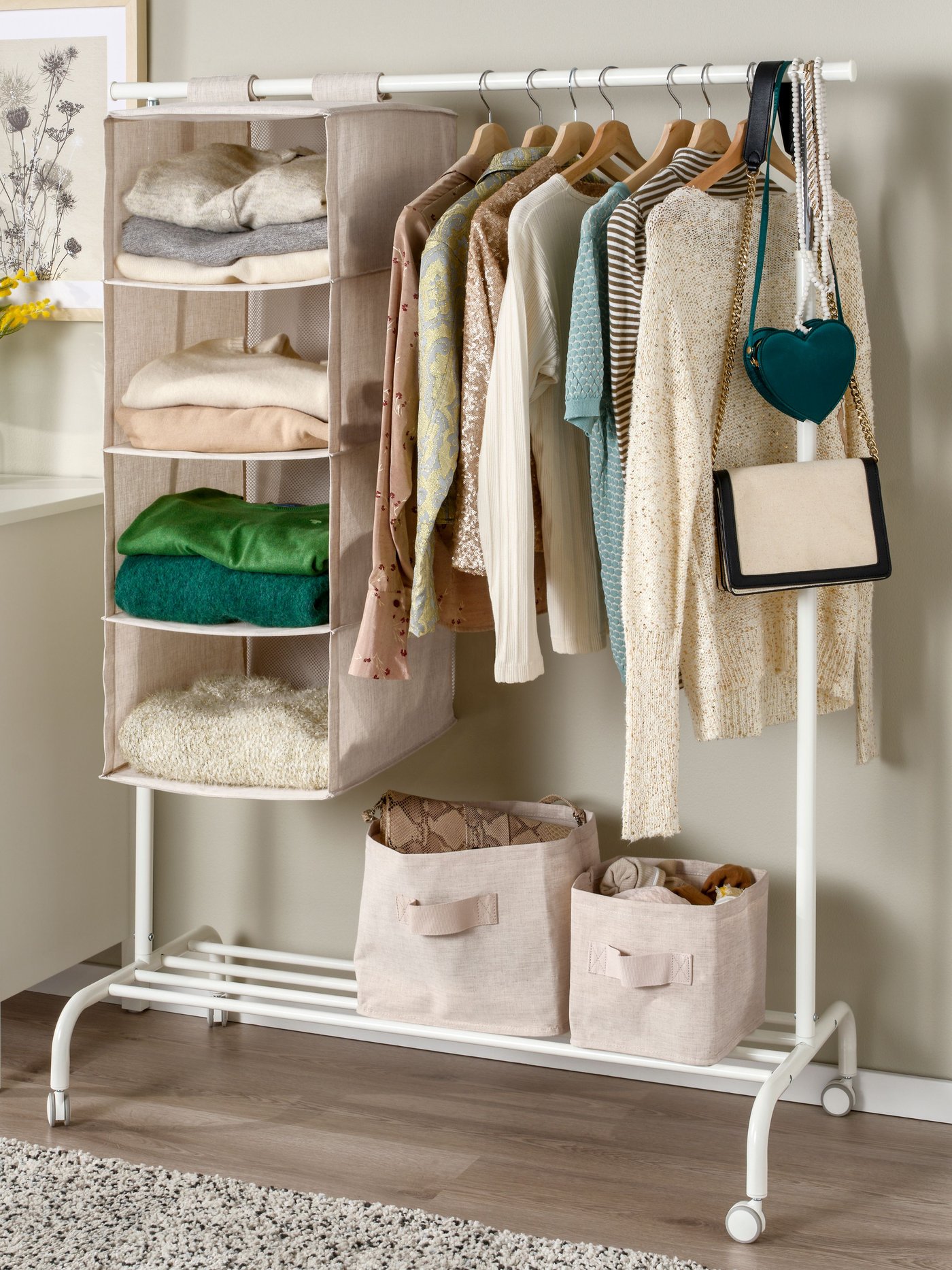 A textile/beige PURRPINGLA hanging storage w 4 compartments