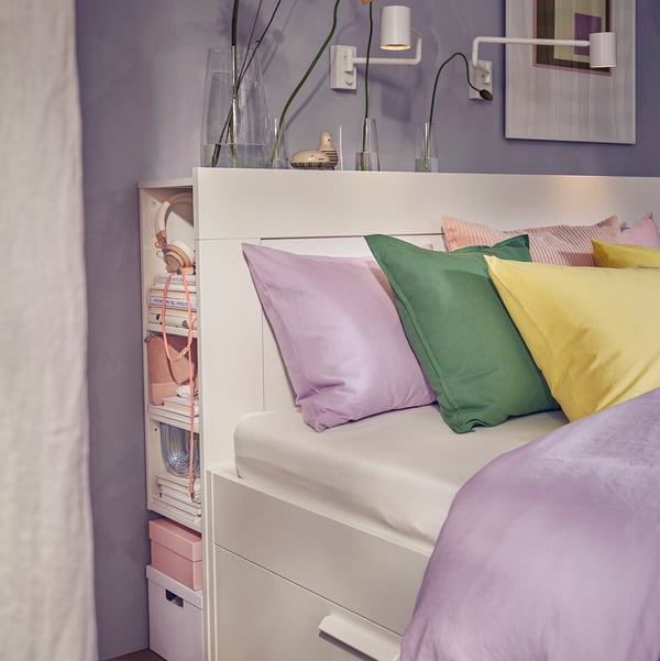 A white/Luröy BRIMNES bed frame w storage and headboard