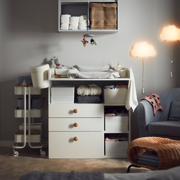 SMÅSTAD baby changing table with wall lamps in master bedroom