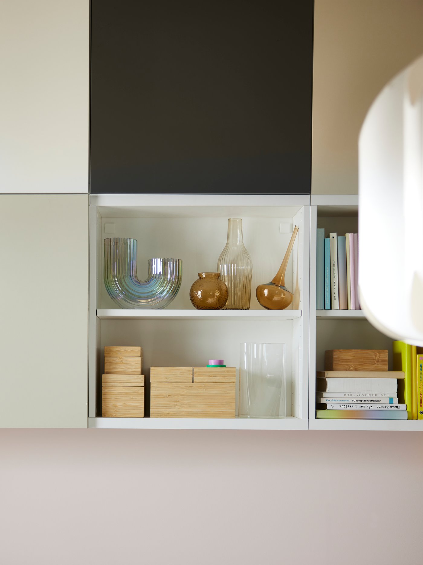 Six BESTÅ frames. Two of the frames show objects on the shelves, and four have LAPPVIKEN doors in various colours on them.