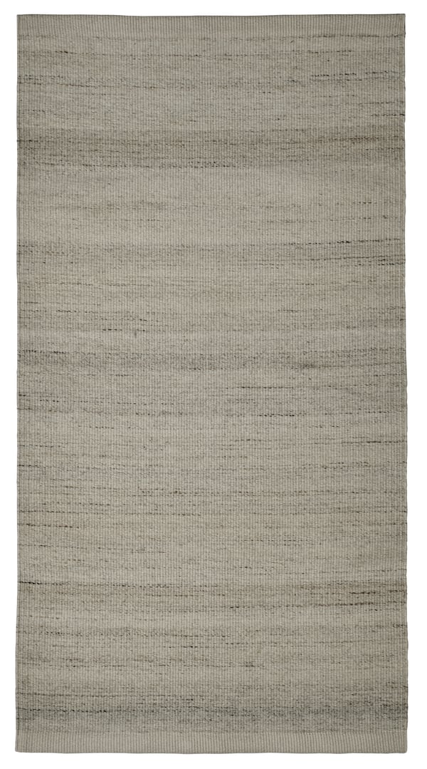 A grey TIDTABELL rug, flatwoven in the NA