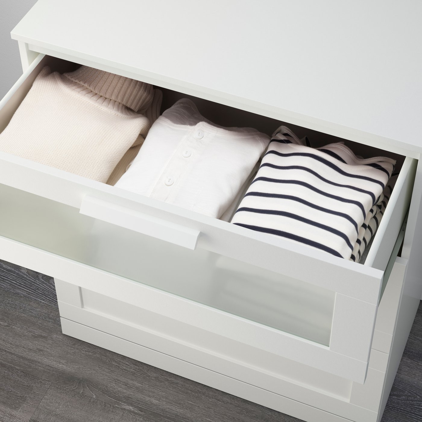 A white/frosted glass BRIMNES chest of 3 drawers