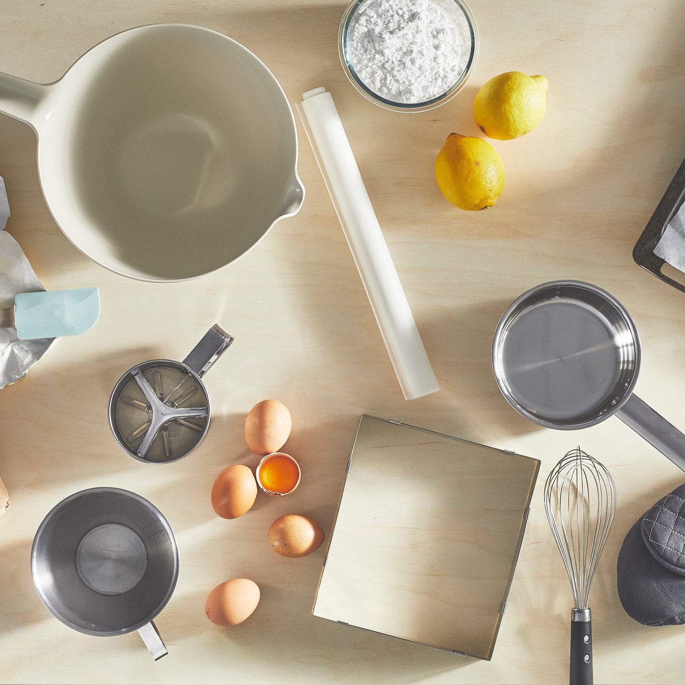 A beige VISPNING mixing bowl