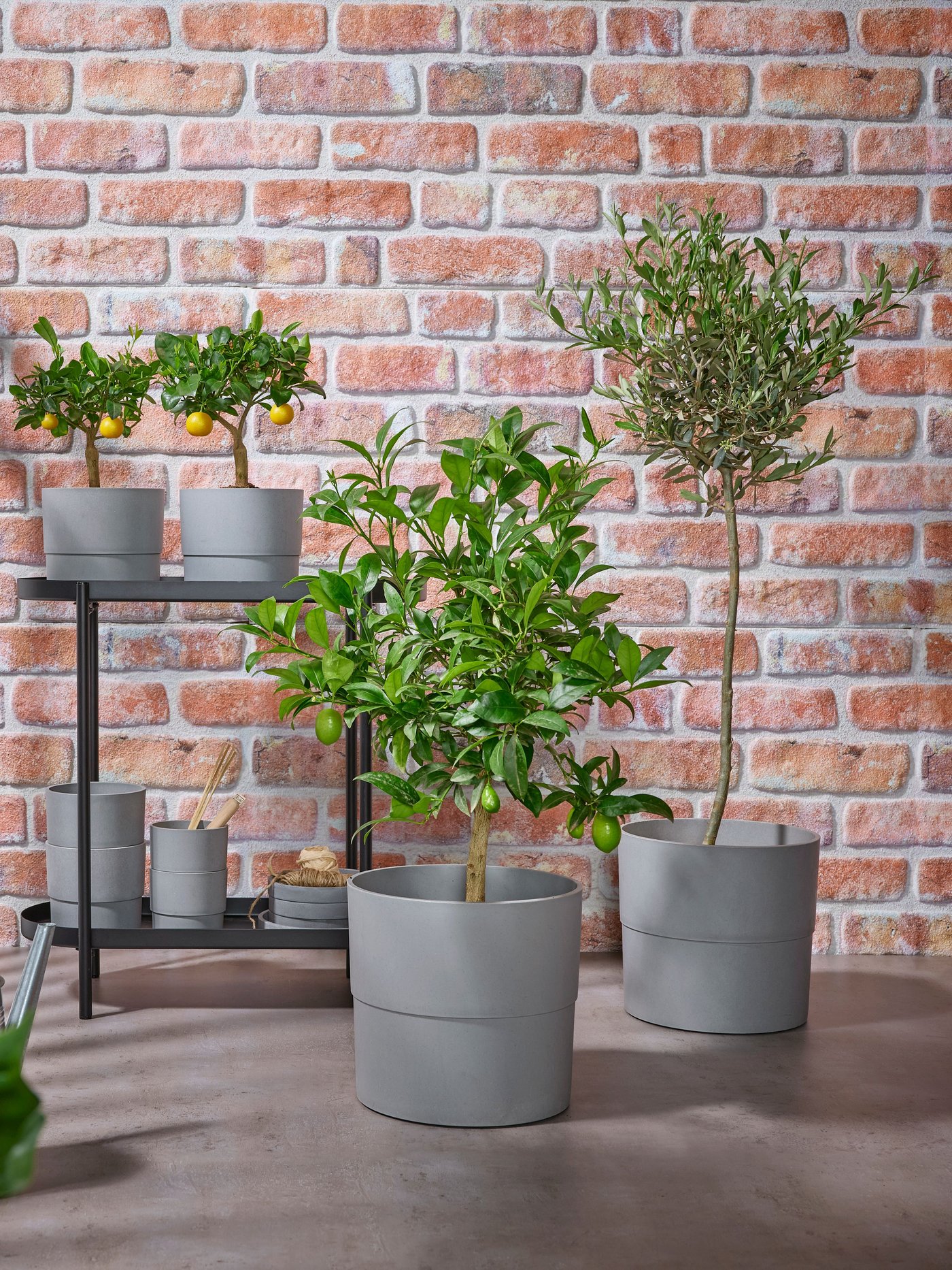 An in/outdoor grey NYPON plant pot