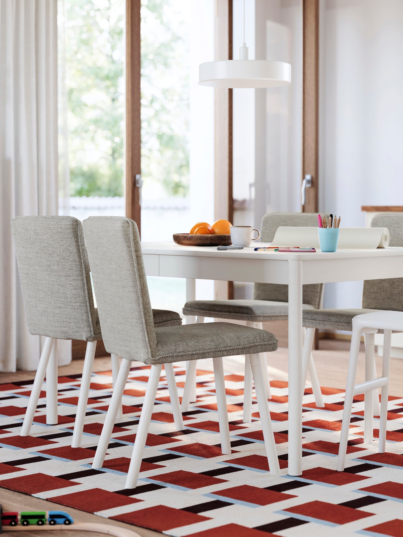 An off-white TONSTAD extendable table