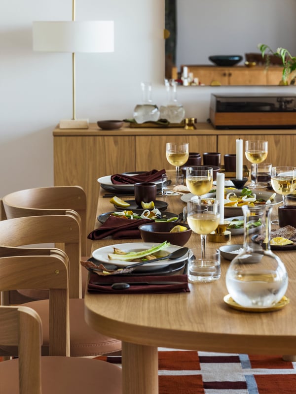 An oak/leather STOCKHOLM 2025 chair in the dining room