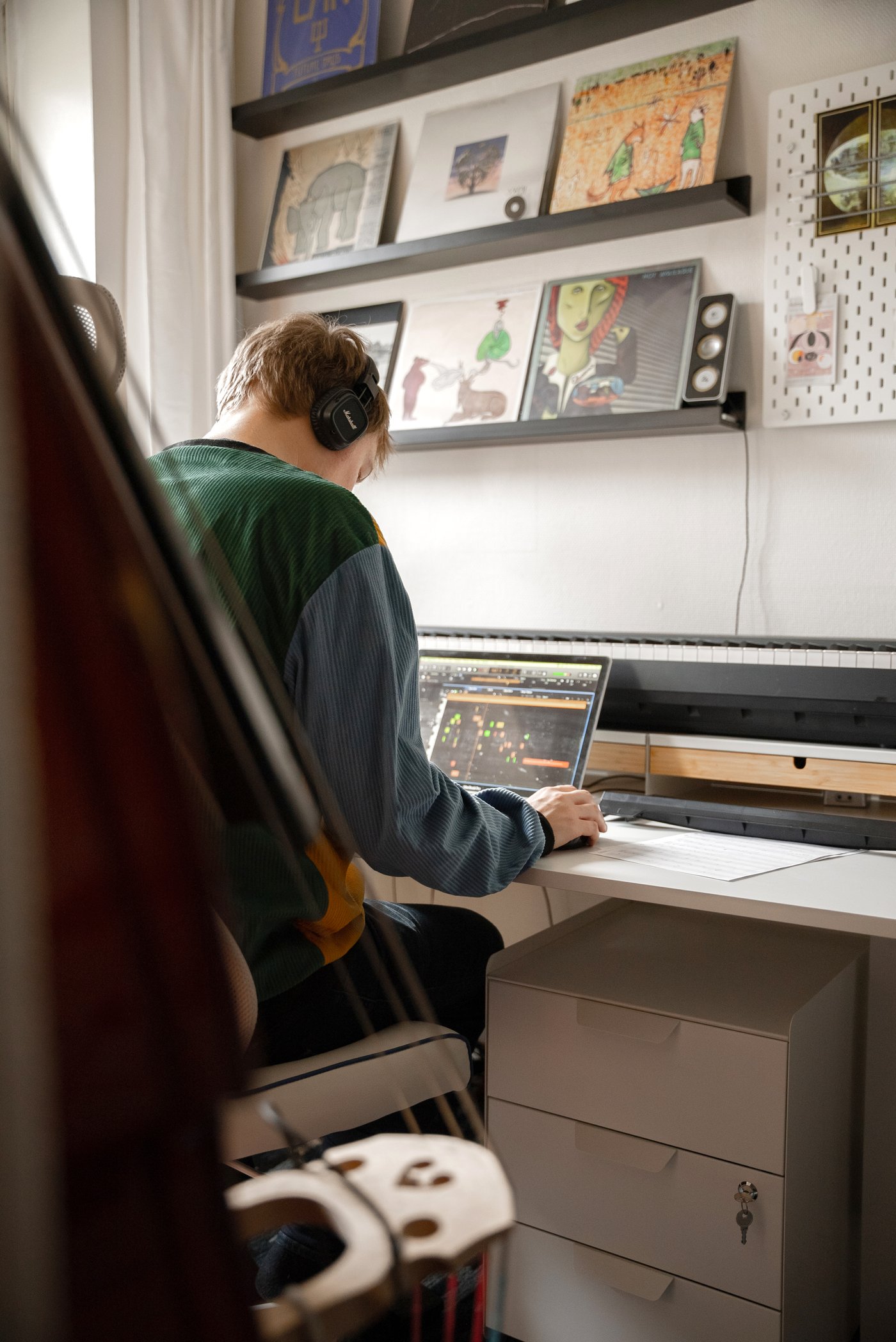 A white ELLOVEN monitor stand with drawer