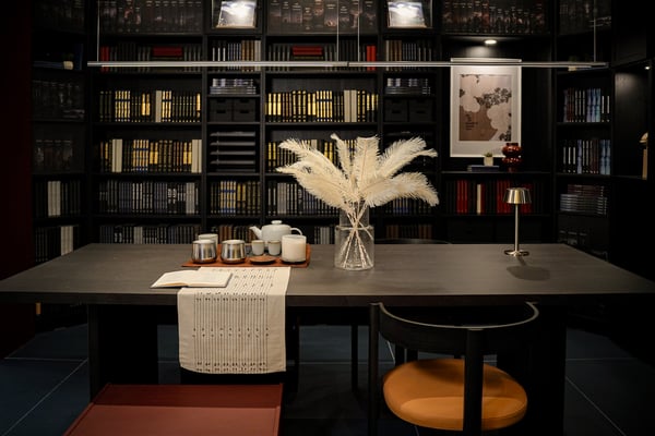 A dark brown ash veneer BERGSHYTTAN table