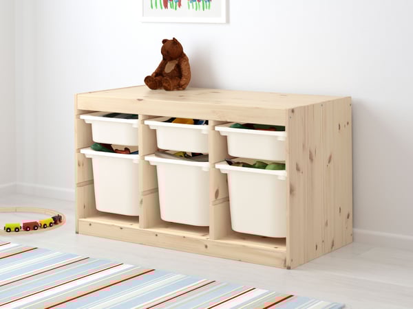 A light white stained pine/white TROFAST storage combination with boxe in children's room