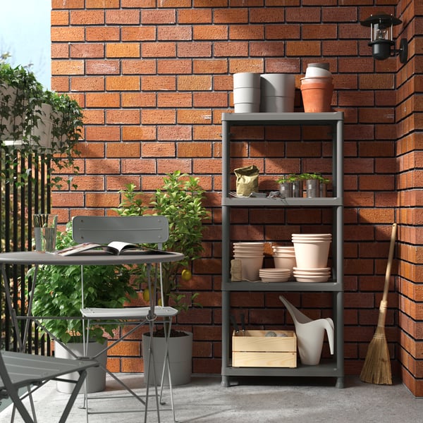 A dark grey indoor /outdoor RUNMARÖ shelving unit