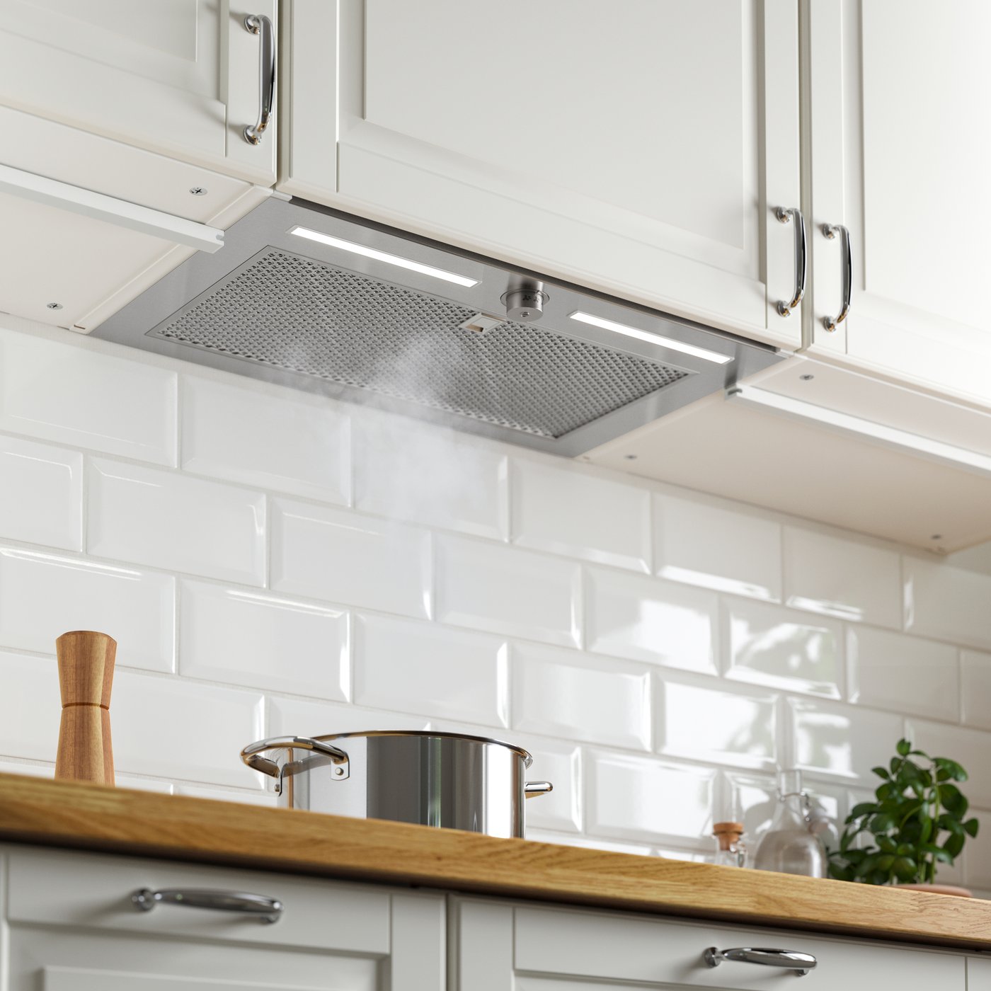 A stainless steel UNDERVERK built-in extractor hood
