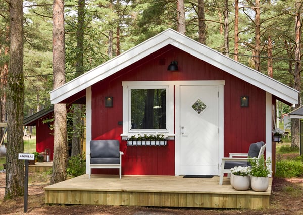 A small red cottage in the woods