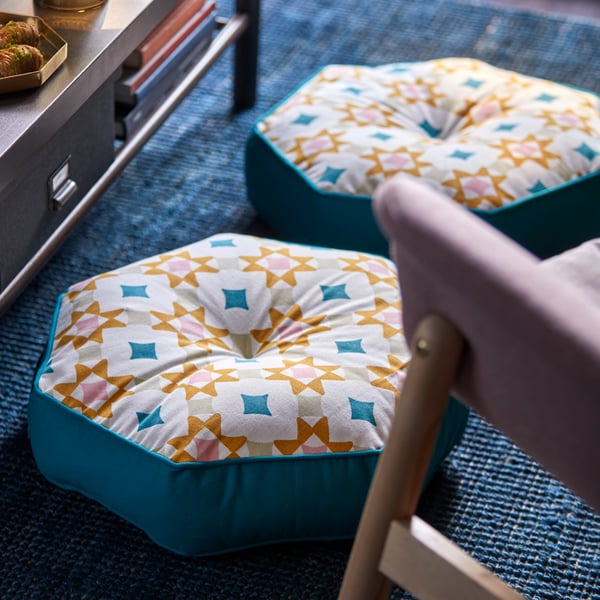 A blue/multicolour GOKVÄLLÅ floor cushion