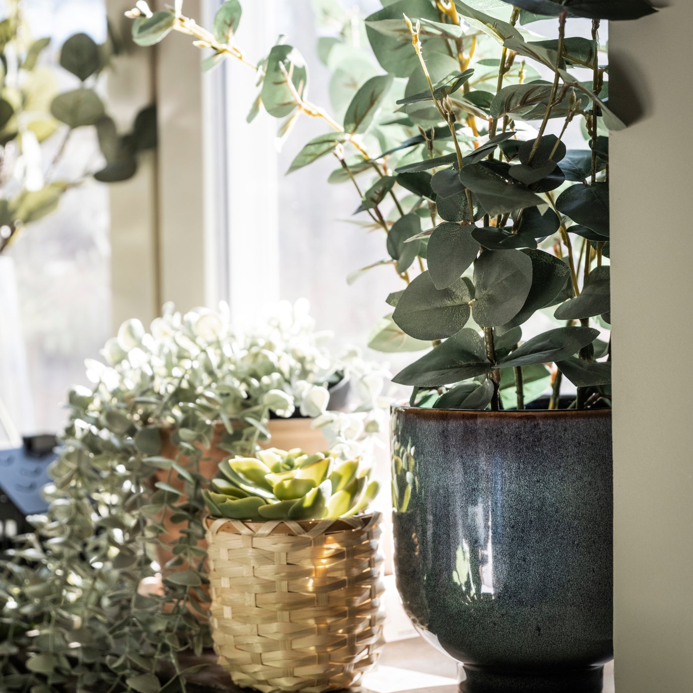 An in/outdoor eucalyptus FEJKA artificial potted plant