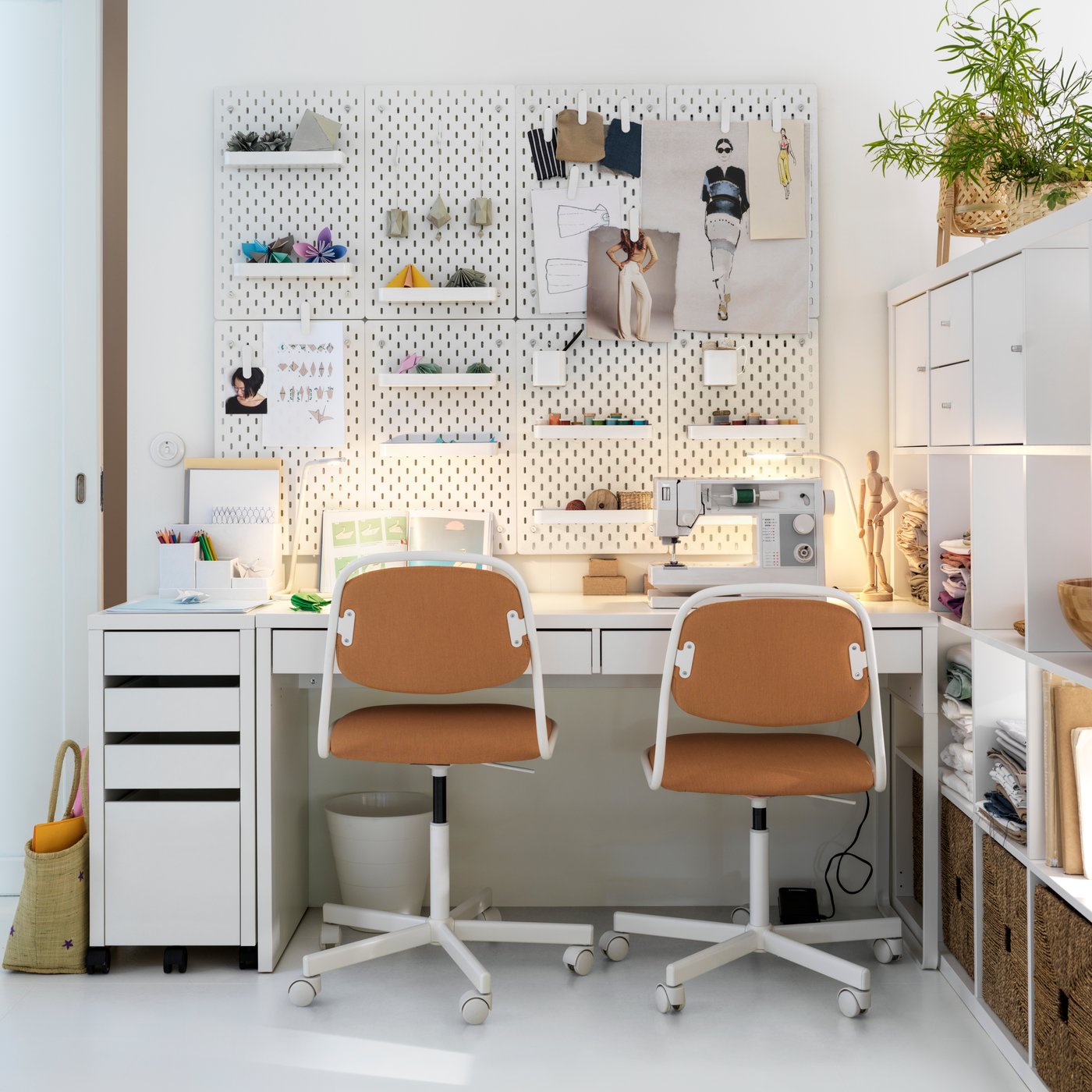 A white SKÅDIS pegboard in the home office