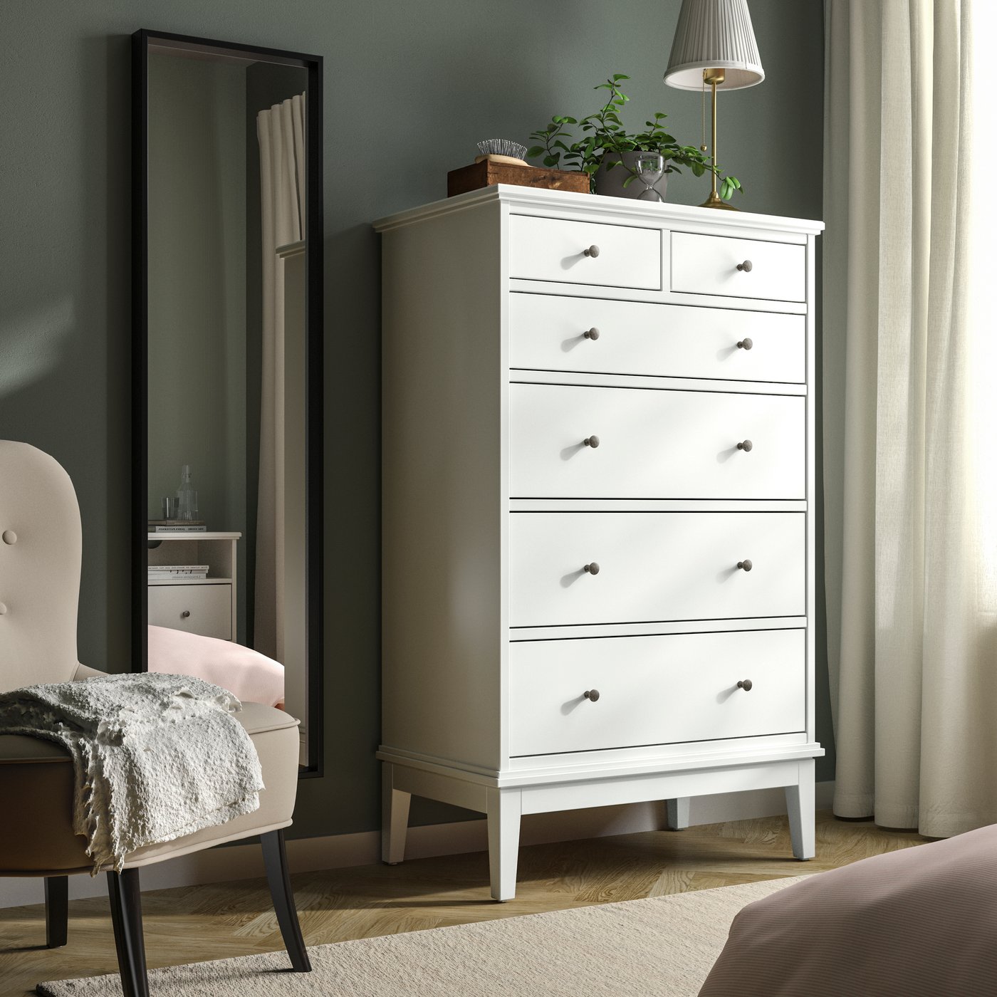 A white IDANÄS chest of 6 drawers