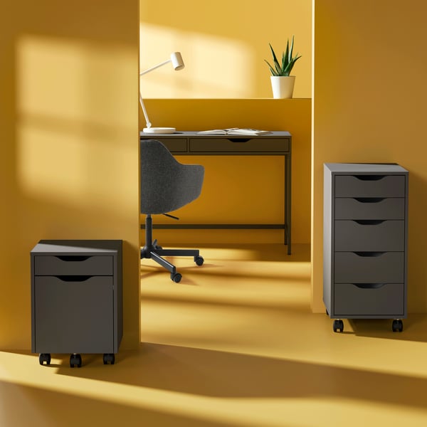 A dark grey/black ALEX drawer unit on castors