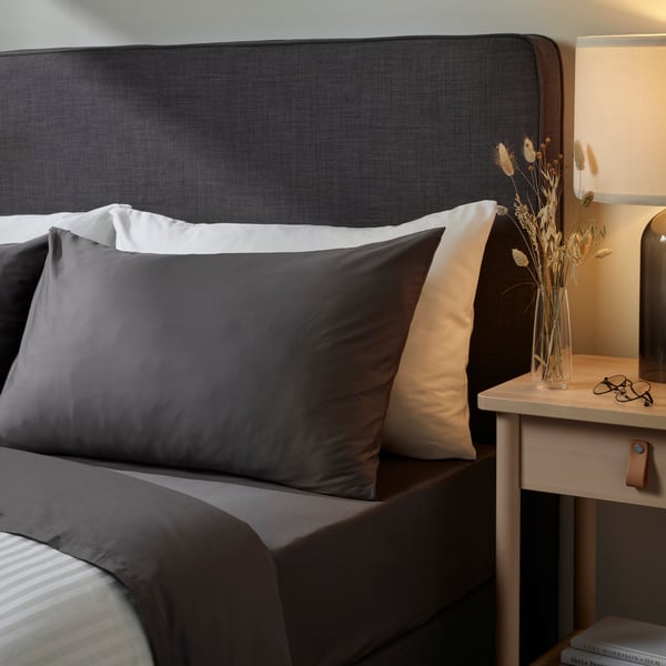 A dark grey NATTJASMIN pillowcase
