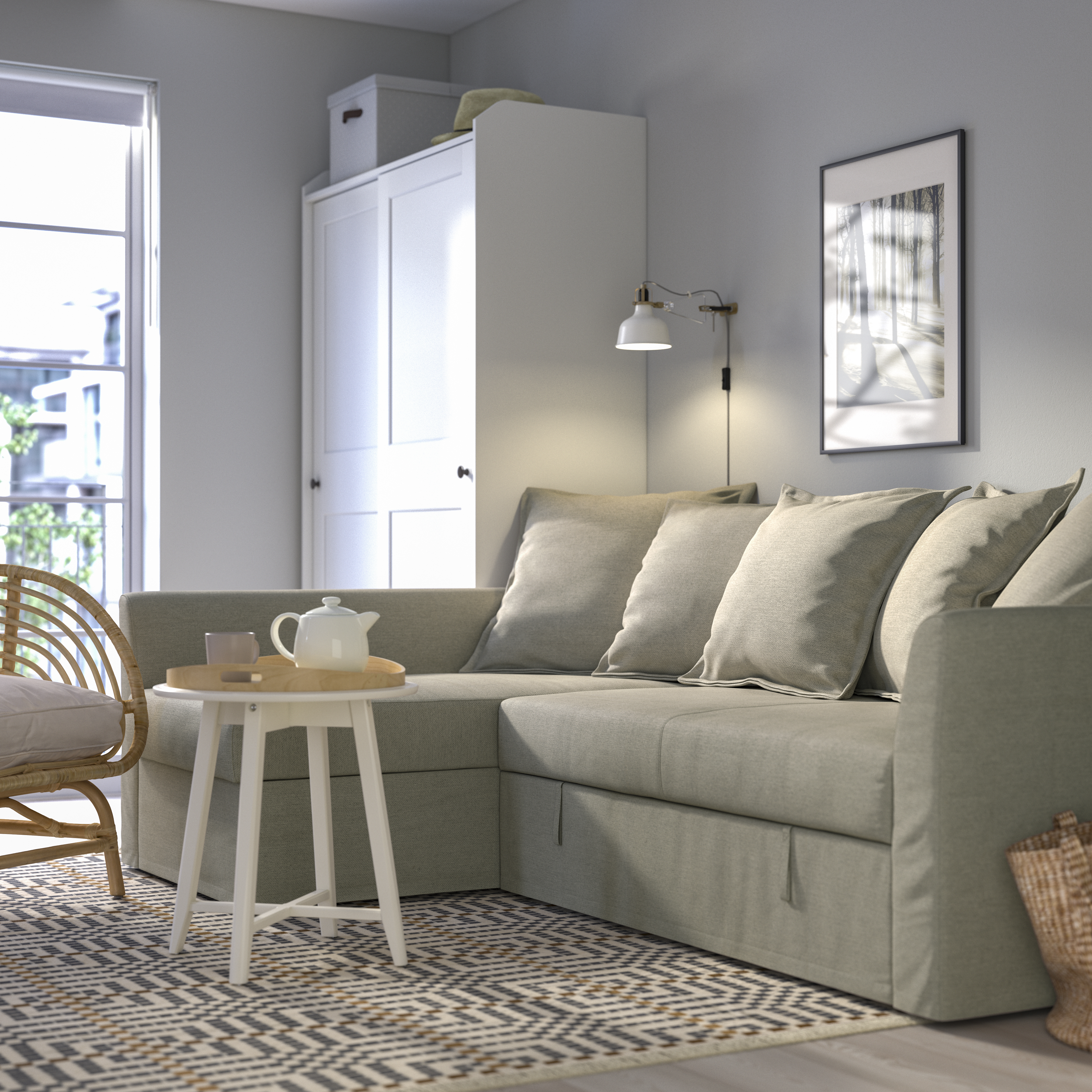 A Borgunda beige HOLMSUND corner sofa-bed