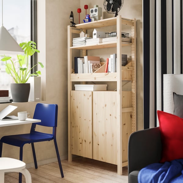 A with box shelf/pine IVAR shelving unit in the living room