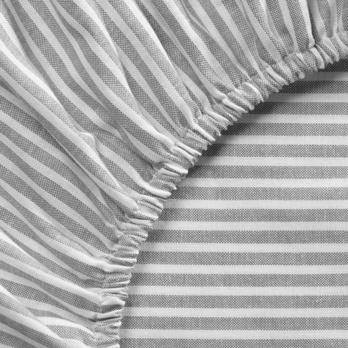 A grey white/stripe SOLFIBBLA fitted sheet