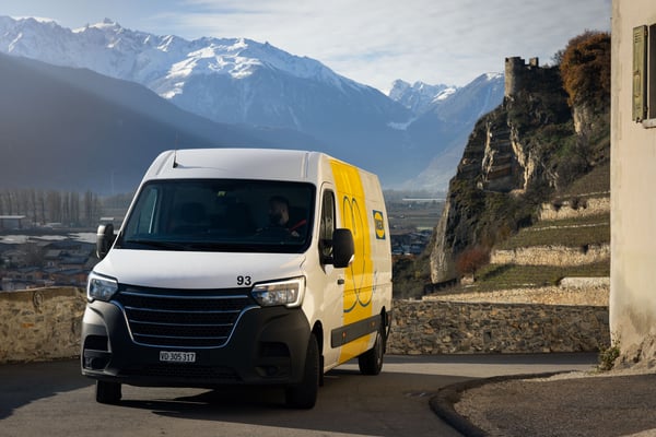 An IKEA EV delivery truck is driving on a road.