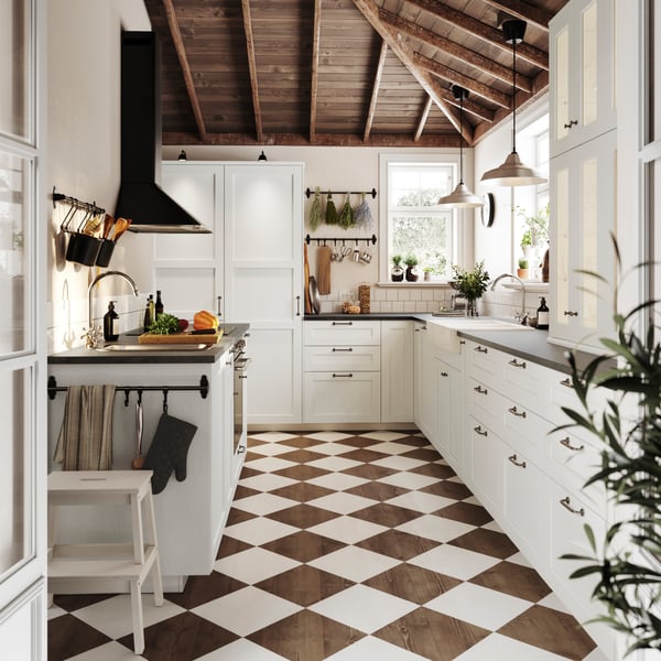 A white wood effect ENKÖPING glass door in the kitchen