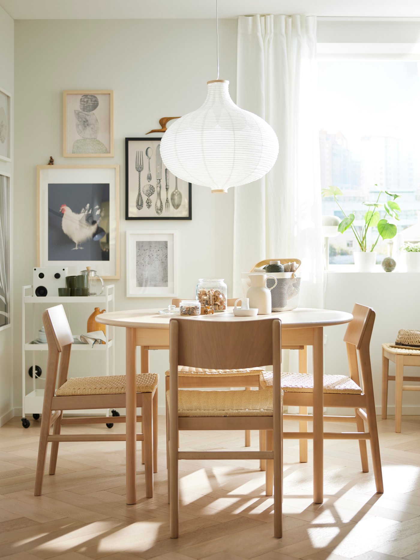 A light beech/veneer SKANSNÄS extendable table