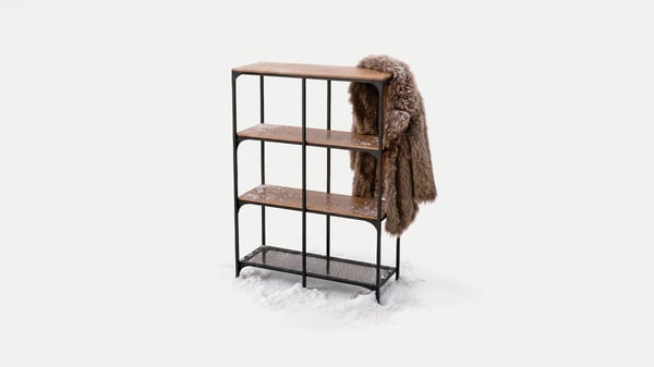 a coat hanging off of a FJÄLLBO shelf unit