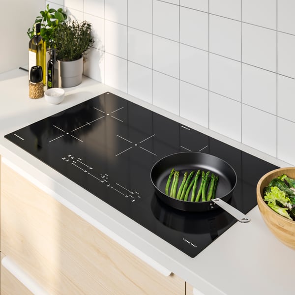 A black ÄLMESTAD induction cooktop