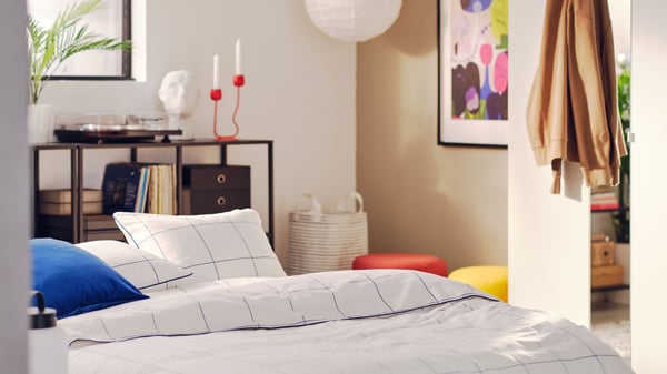 An in/outdoor Areca palm FEJKA artificial potted plant in the bedroom