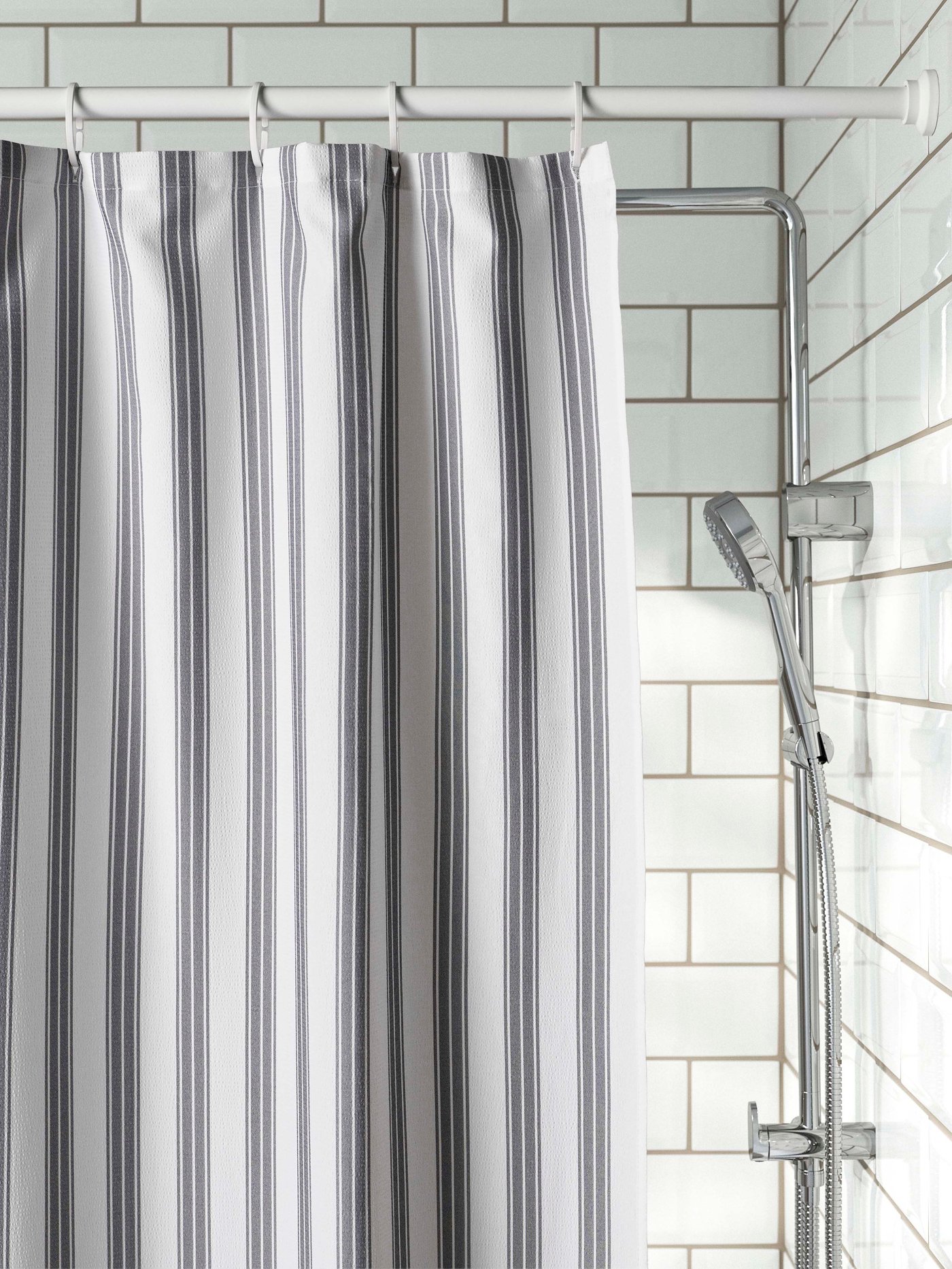 A white BOTAREN shower curtain rod