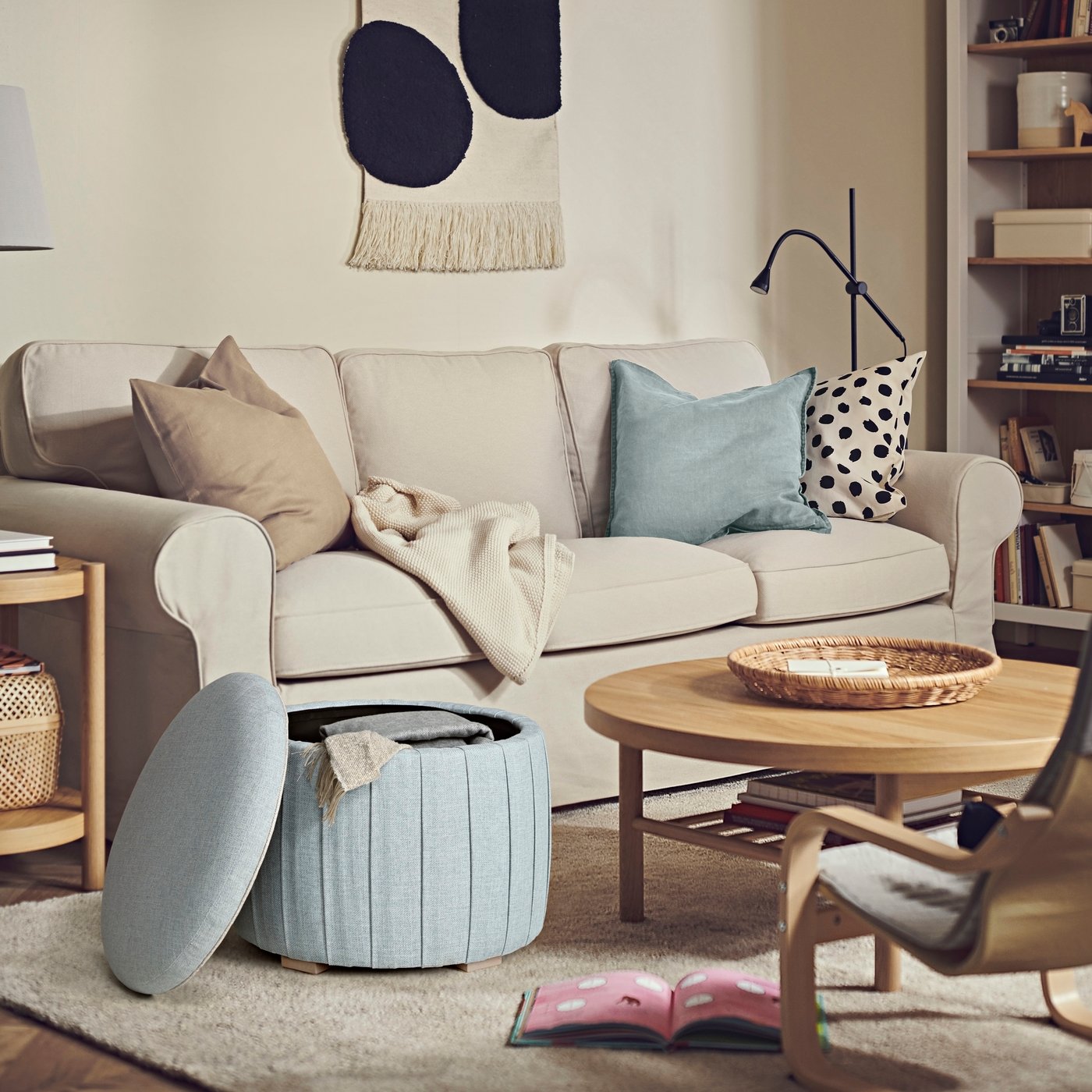 A with storage/Kilanda light blue ÅTERLÖGA pouffe