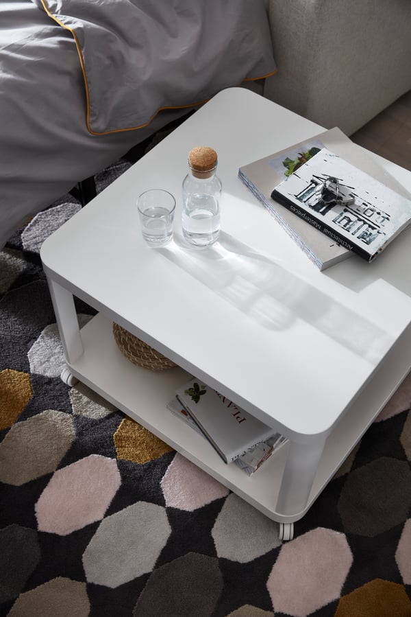 A white TINGBY side table on castors in the living room