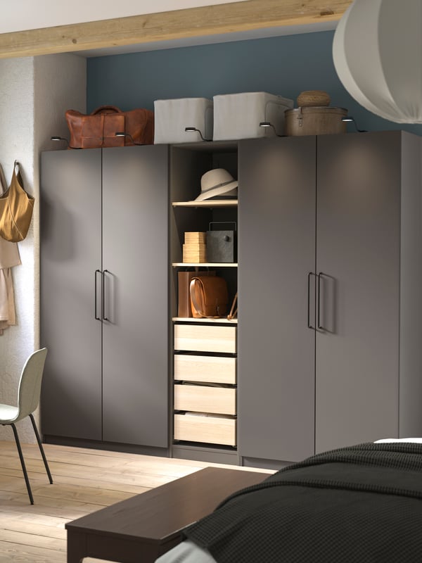 A dark grey/white stained oak effect dark grey PAX wardrobe combination.