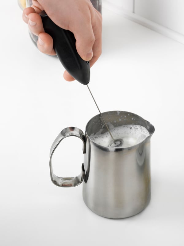 A black PRODUKT milk-frother