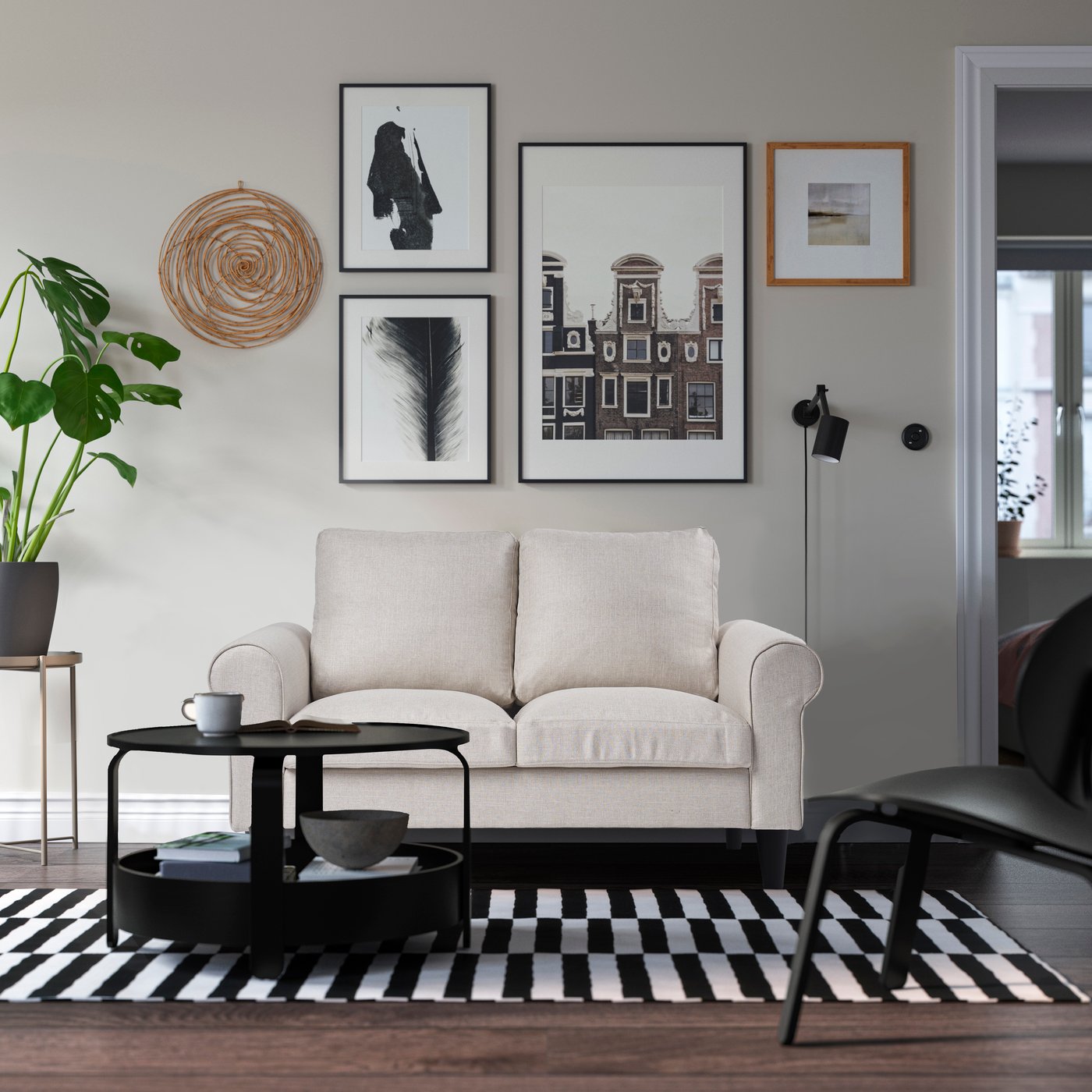 A Kilanda light beige GAMMALBYN 2-seat sofa in the living room