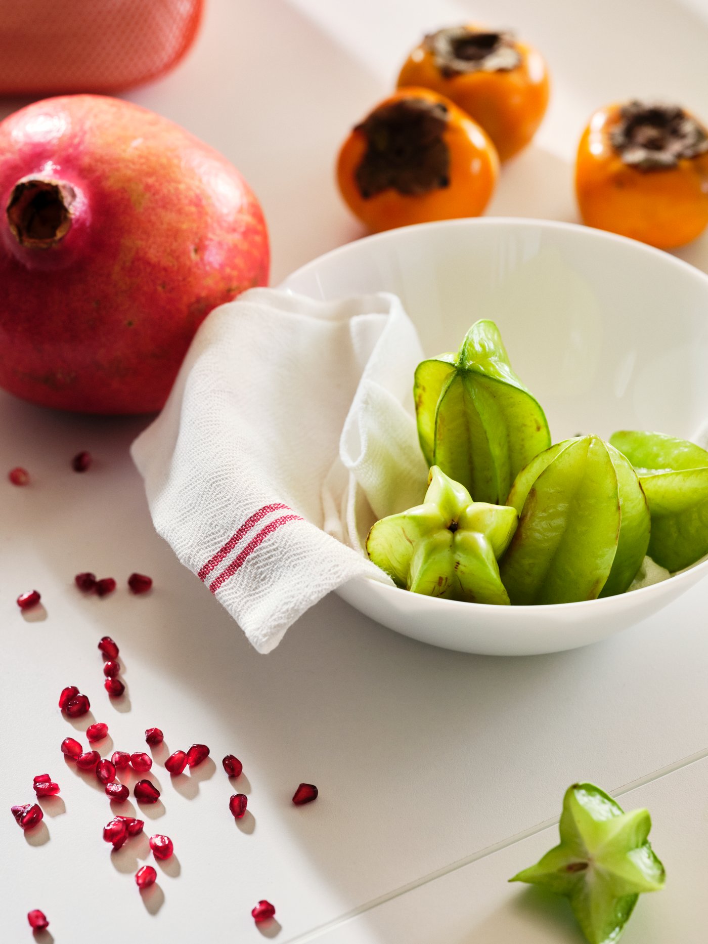A white OFTAST serving bowl in the dining room