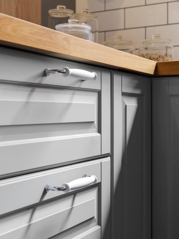 A grey BODBYN drawer front in the kitchen