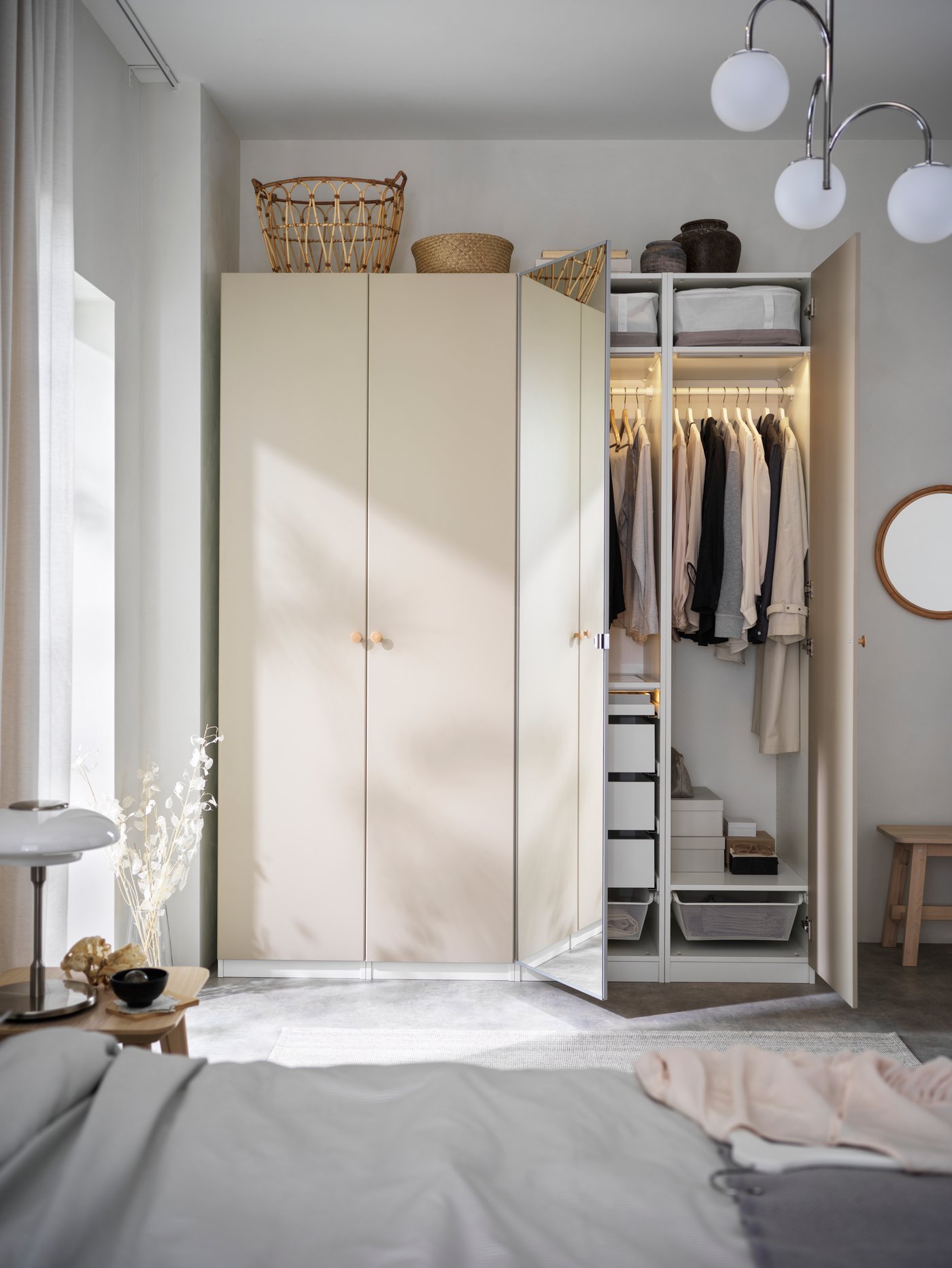 A nickel-plated/opal white glass TÄLLBYN table lamp in the bedroom