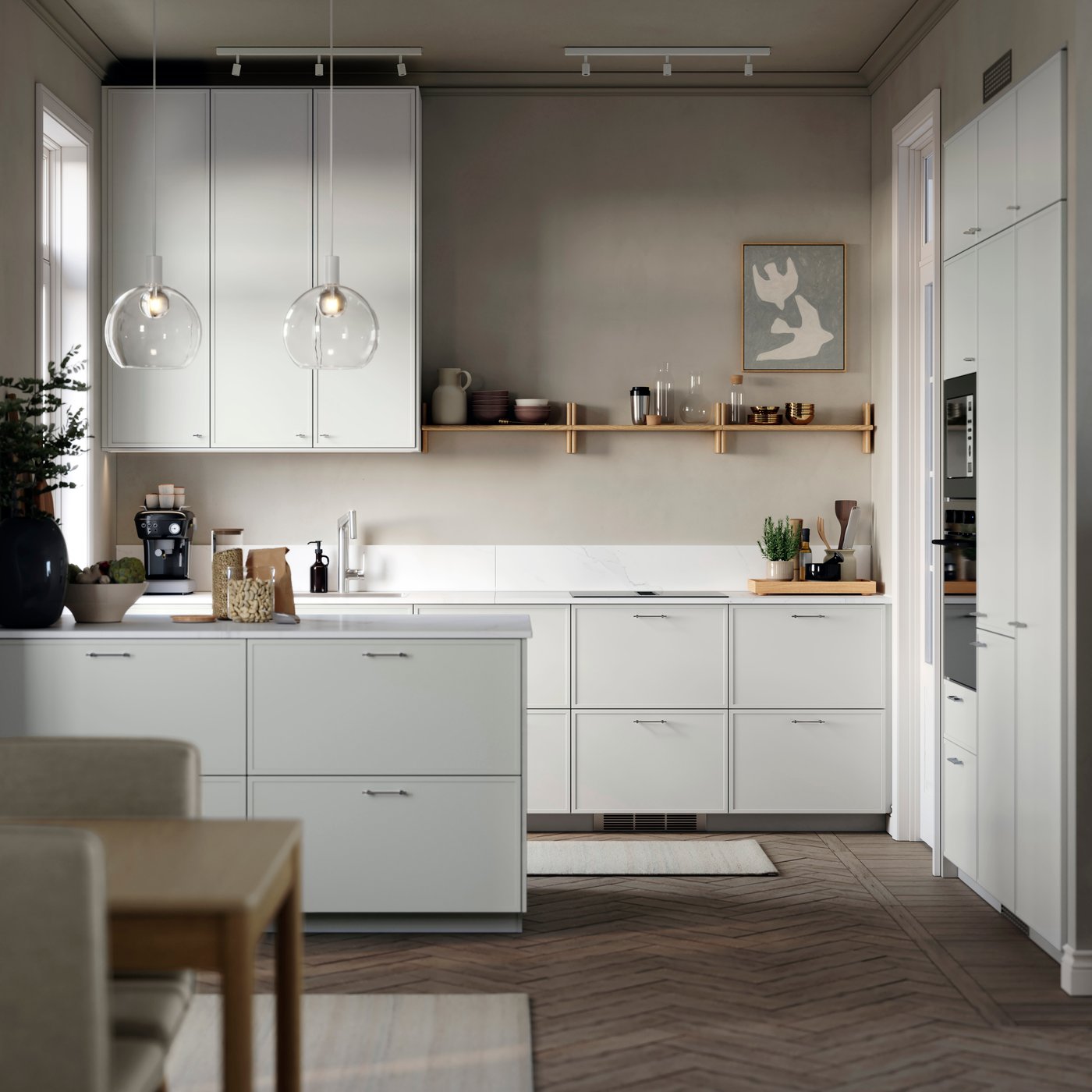 A modern kitchen featuring light-grey ASPUDDEN kitchen fronts, dark beige walls, wooden floors, and a white kitchen worktop.