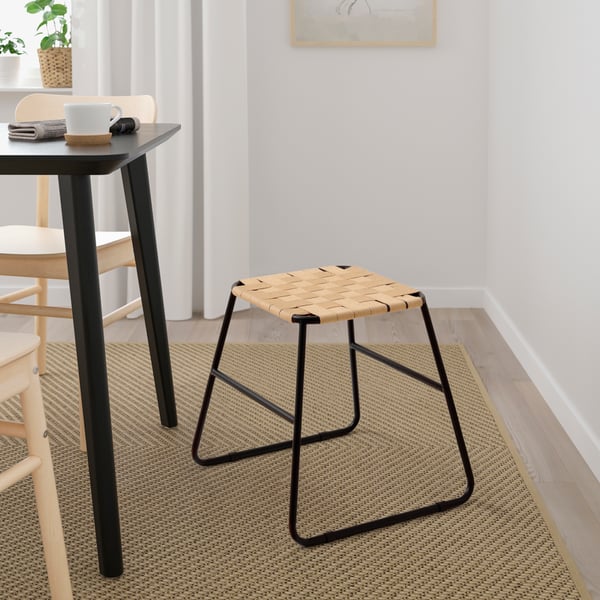 A black/natural BOESKIL stool