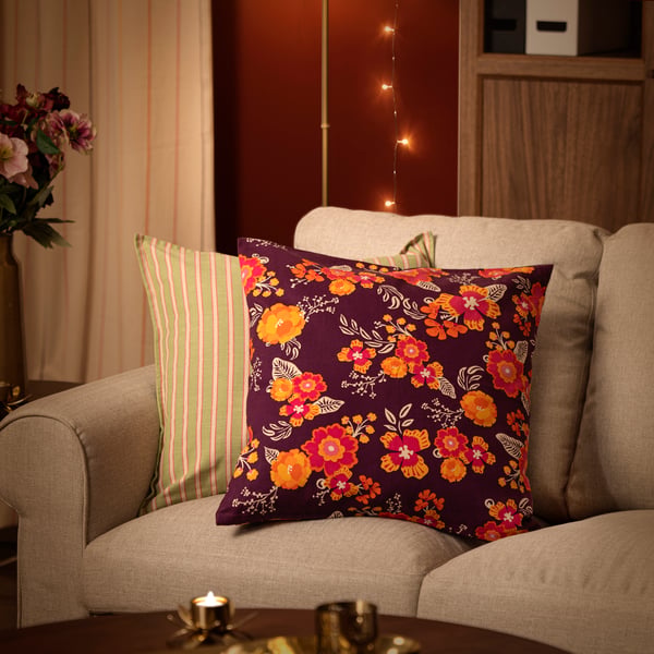 A floral pattern/yellow AROMATISK cushion cover
