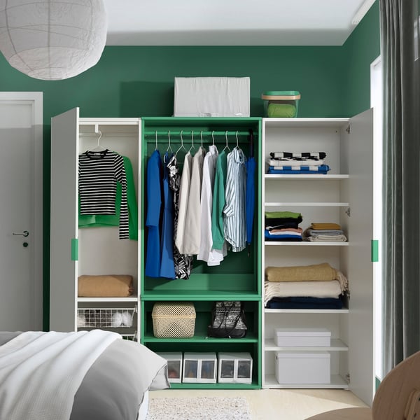 A white Fonnes/green PLATSA wardrobe with 2 doors