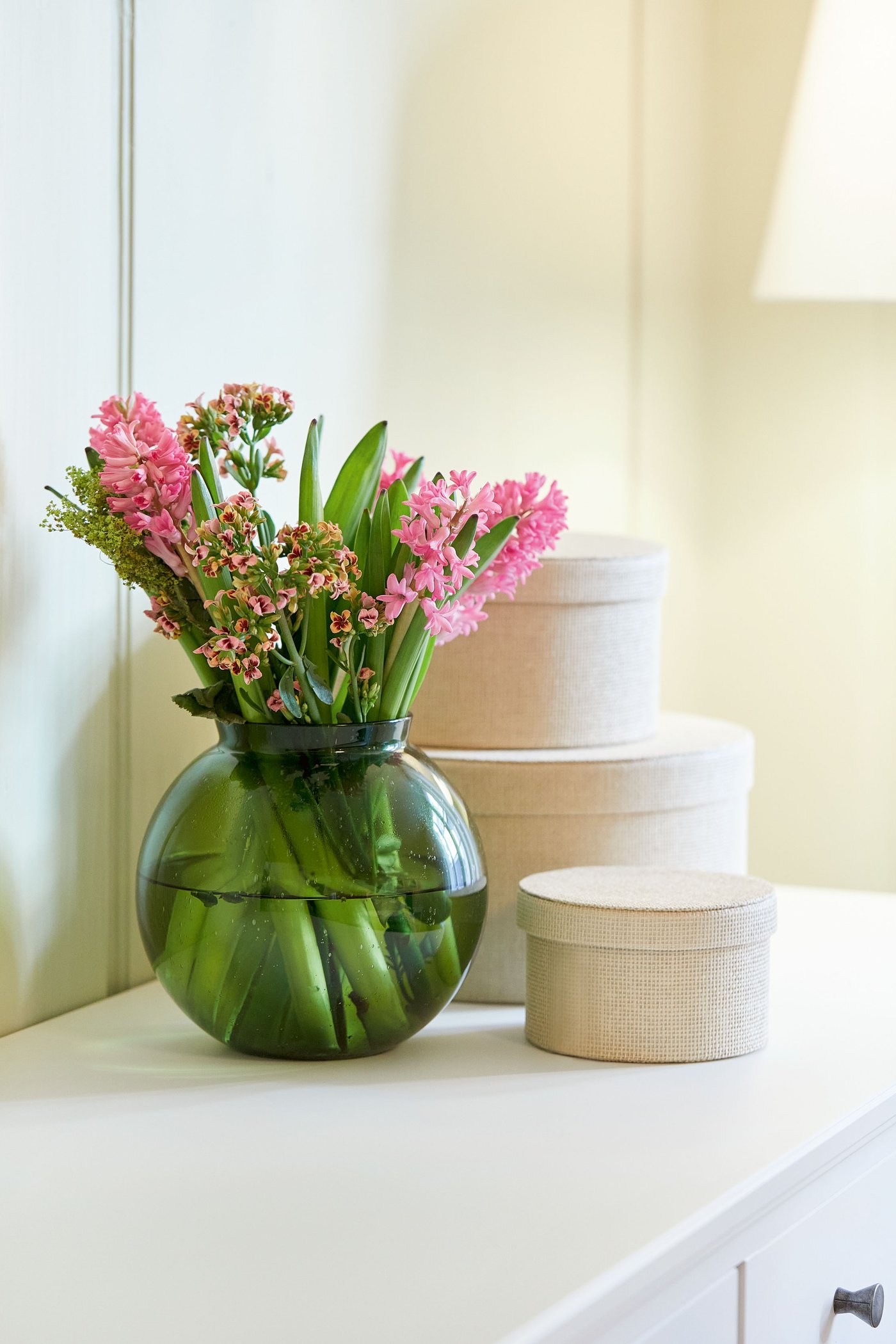 A beige KVARNVIK storage box