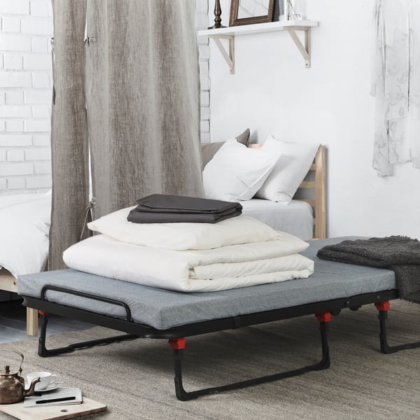 A black NORRUDDEN guest bed