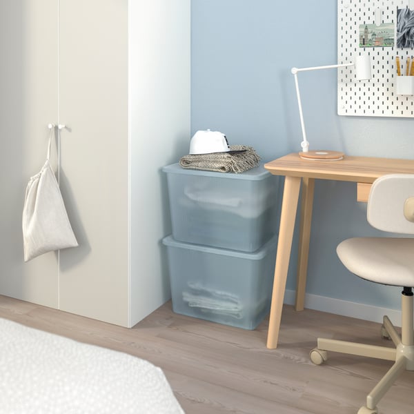 A transparent grey-blue RYKTA storage box with lid