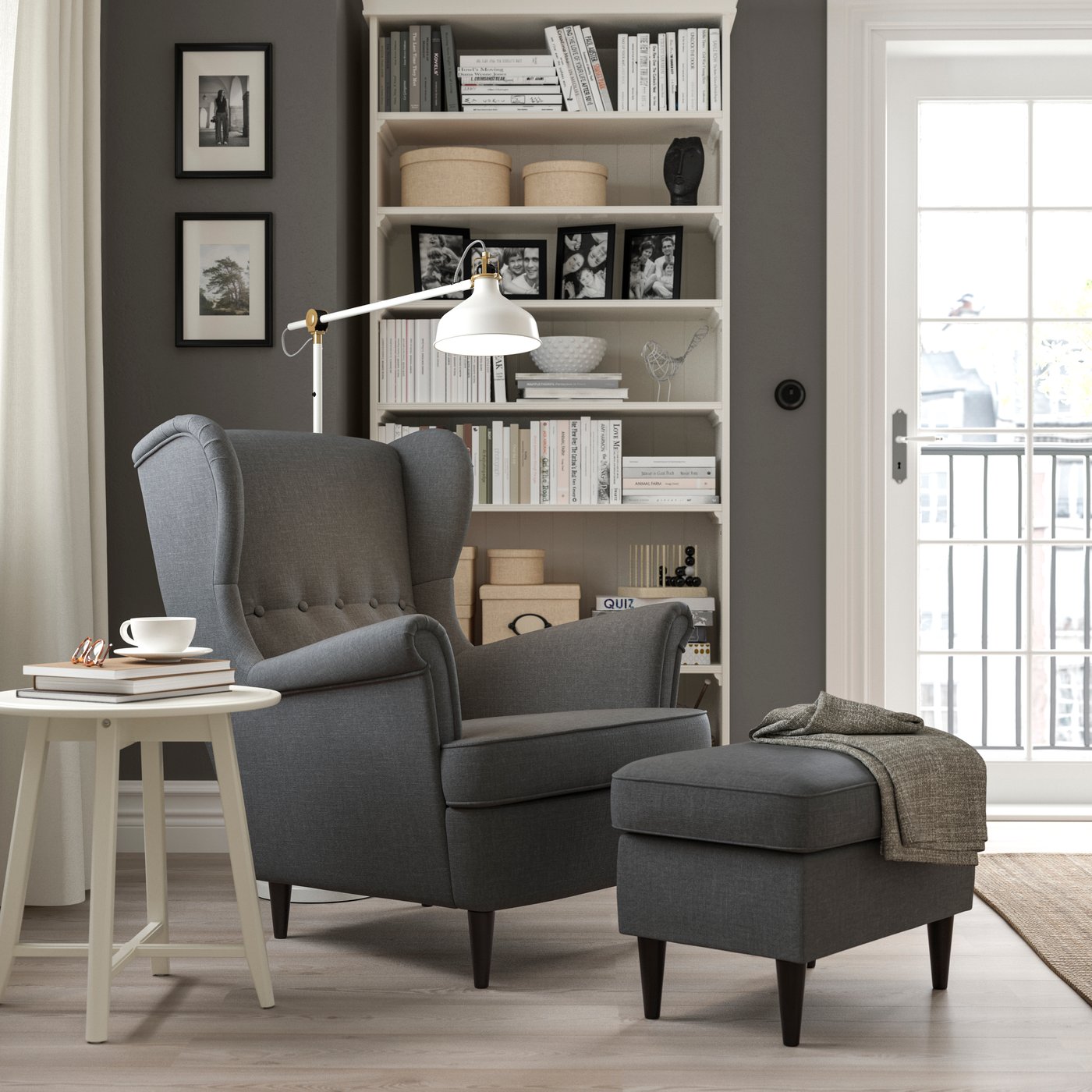 A Nordvalla dark grey STRANDMON wing chair