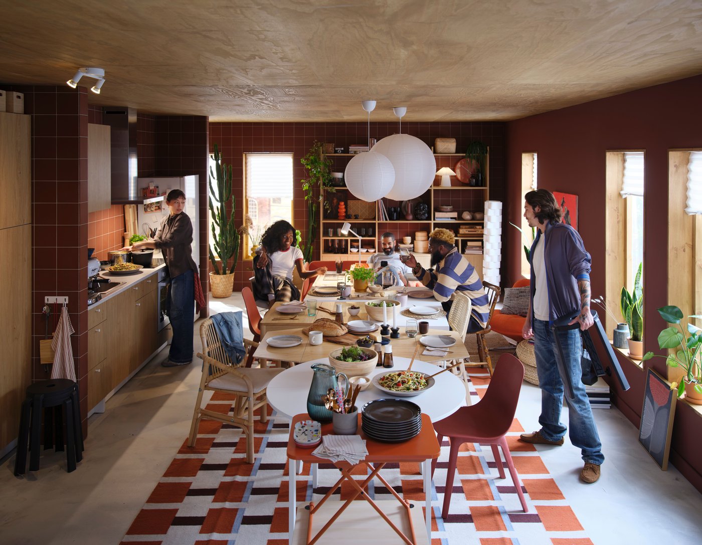 A red ODGER chair in the kitchen