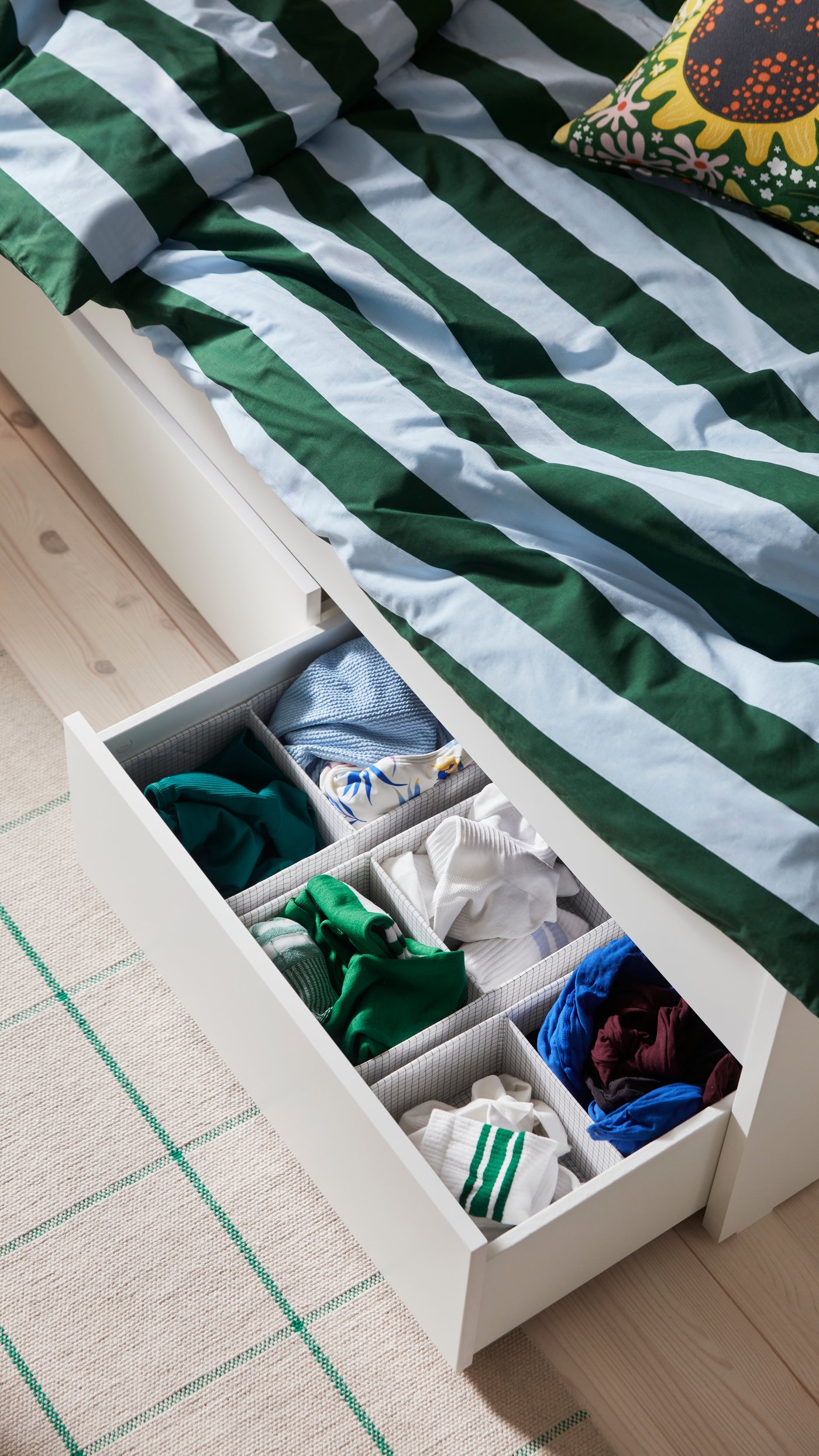 A light blue dark green/stripe SLÅNHÖSTMAL duvet cover and pillowcase